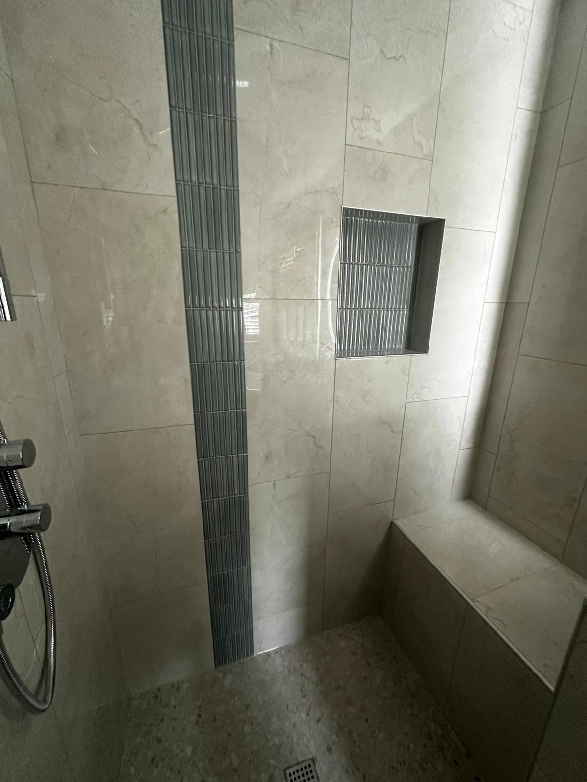 Tiled shower niche and bench